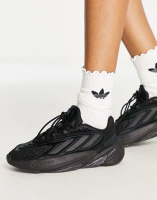 adidas Originals Ozelia trainers in triple black