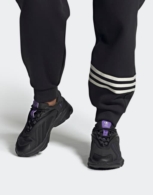 adidas Originals - Oztral - Sneakers in zwart en paars