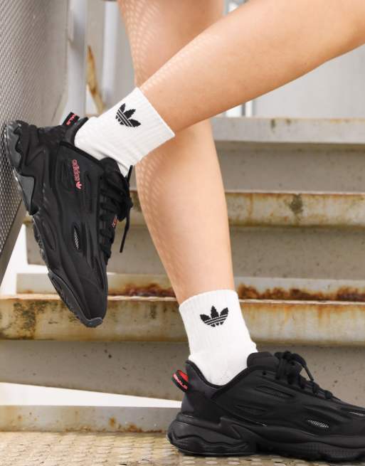 adidas Originals Ozweego Celox sneakers in black with pink details