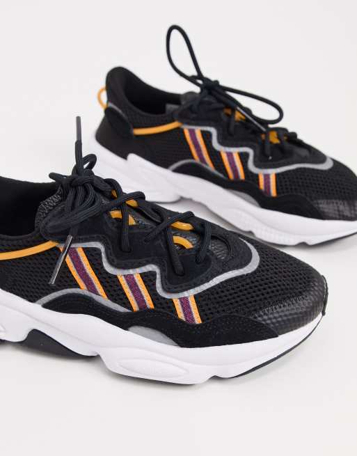 adidas Originals Ozweego in black and orange