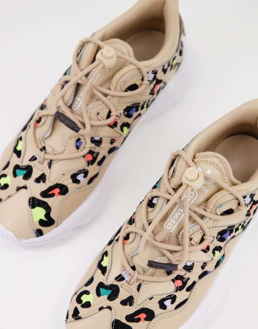 adidas Originals Ozweego Plus trainers in beige with colourful leopard print |