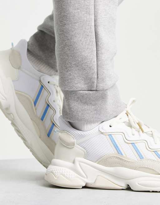 Adidas originals ozweego sneakers shop in white and blue