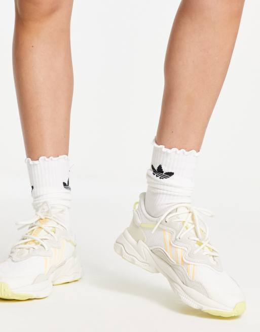 adidas Originals Ozweego trainers in off-white