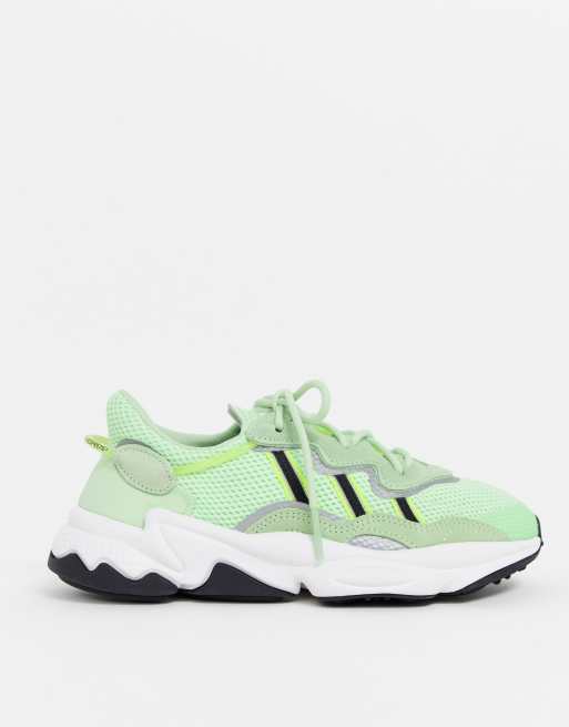 adidas Originals Ozweego trainers in neon green