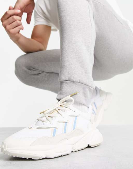 adidas Originals Ozweego trainers in off-white