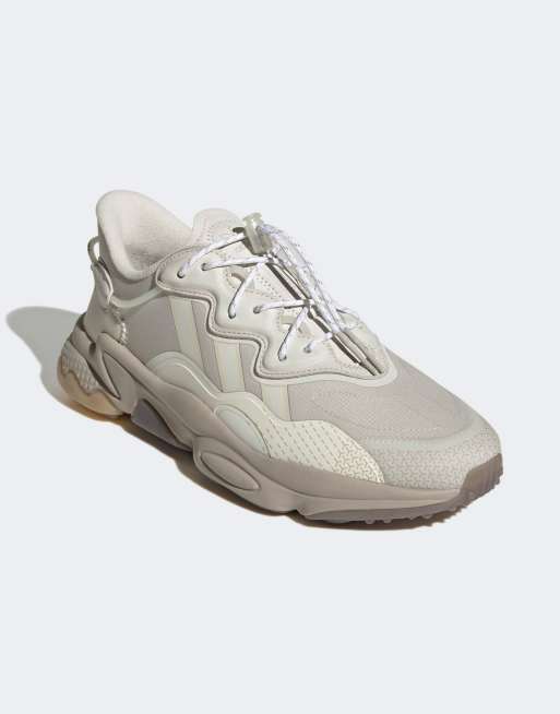 adidas Originals Ozweego trainers in off white