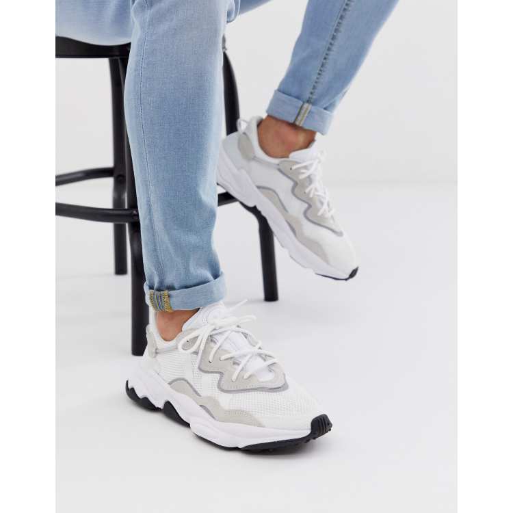 adidas Originals Ozweego trainers in triple white