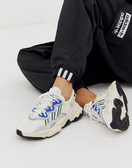 adidas Originals Ozweego trainers in white and blue