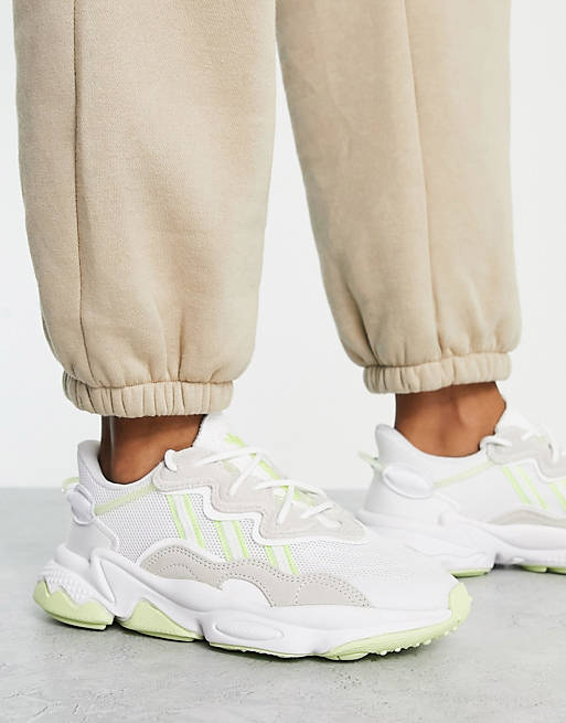 Postman tight Monica adidas Originals Ozweego trainers in white with lime details | ASOS
