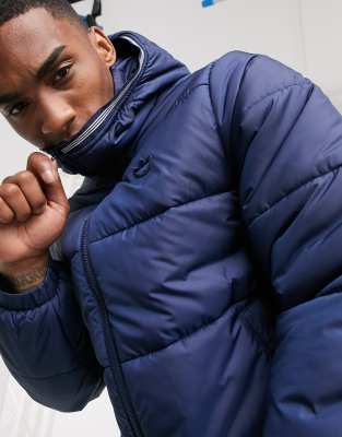 adidas originals logo padded jacket in navy