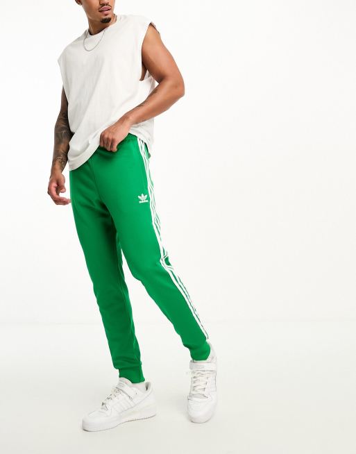 Jogging adidas shop vert et blanc