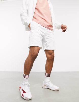 pantaloncini adidas bianchi con strisce nere
