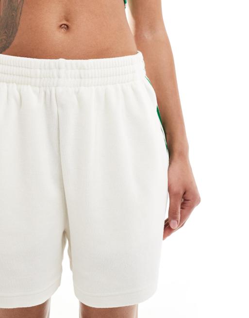 Pantaloncini adidas verdi e bianchi hotsell