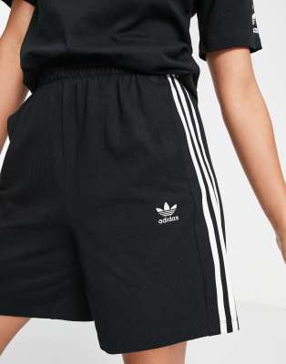 Pantaloncini adidas on sale neri strisce bianche