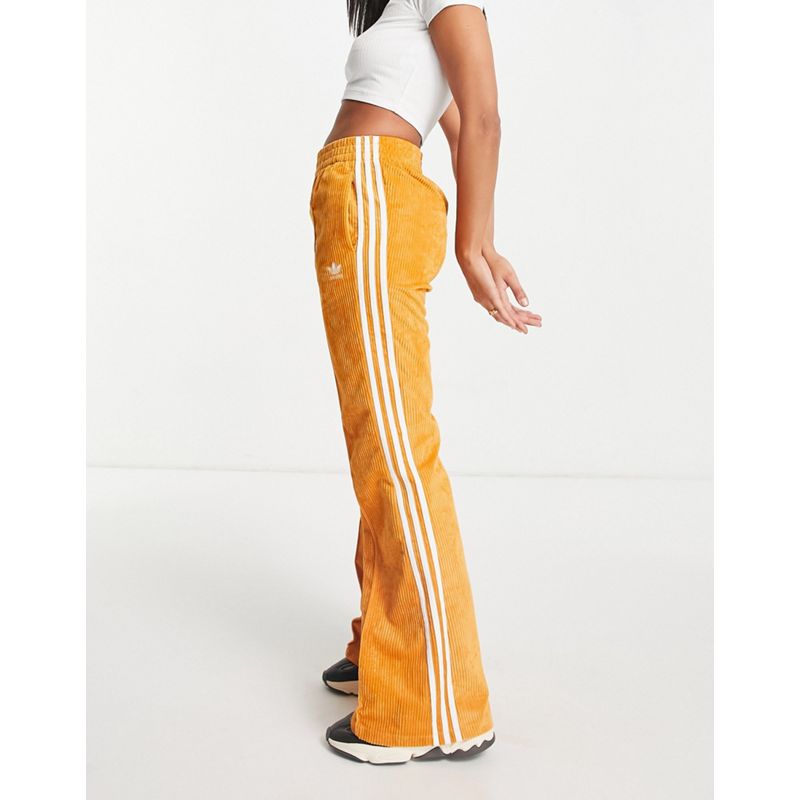 Donna pxBIN adidas Originals - Pantaloni a zampa in velluto a coste con tre strisce, colore arancione