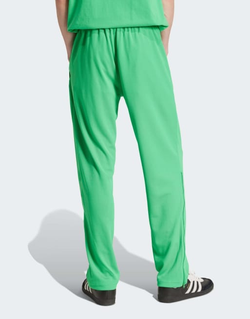 adidas Originals Pantaloni a zampa verde energia con zip ASOS