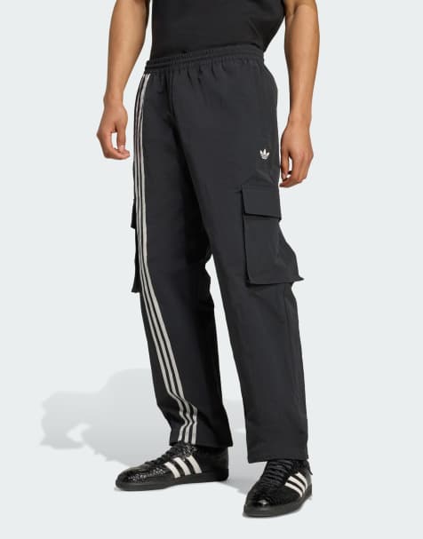 adidas Originals - Pantaloni cargo neri con strisce sul davanti - view 1