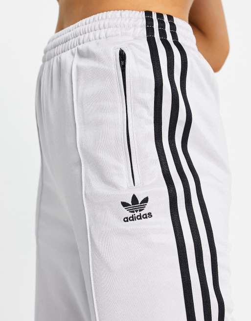 adidas Originals Pantaloni sportivi lucidi colore argento