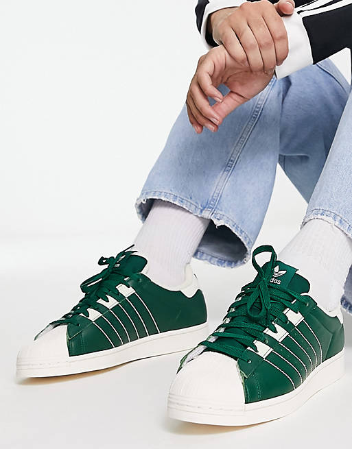 Originals Parley sneakers in dark green | ASOS