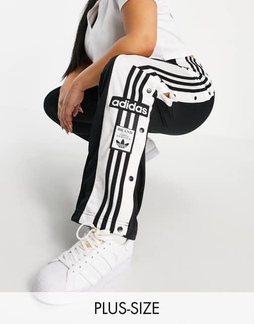 Adidas track pants 2025 logo on side