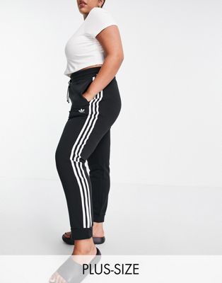 adidas Originals Plus adicolor three stripe slim fit joggers in black ...