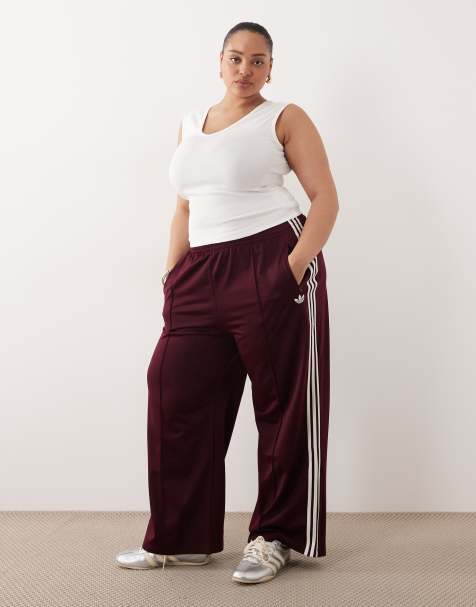 adidas Originals Plus – Firebird – Bordowe spodnie dresowe o luźnym kroju - view 1