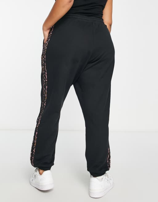 adidas Originals Plus jogger with leopard print three stripe in