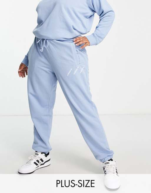 adidas Originals Plus Logomania triple logo joggers in light blue MBLUE ASOS