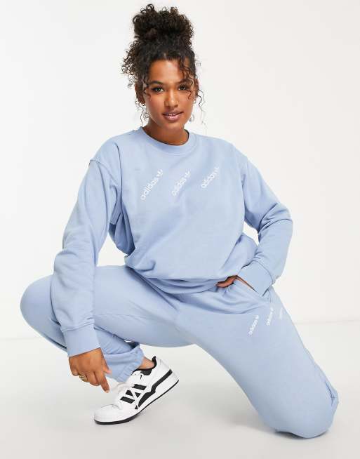 adidas Originals Plus 'Logomania' repeat logo leggings in light blue, ASOS