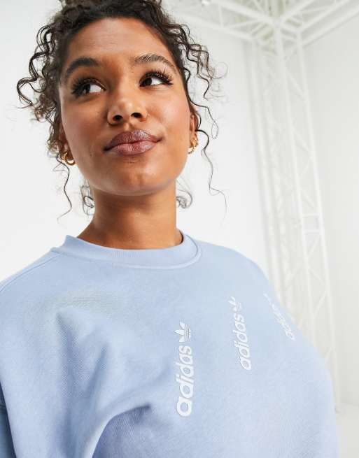 Telemacos vest er nok adidas Originals Plus Logomania triple logo sweatshirt in light blue -  MBLUE | ASOS