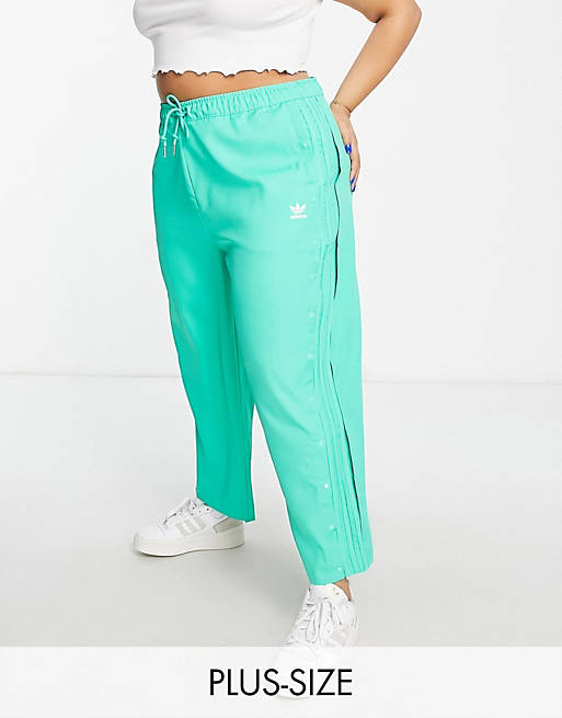 adidas Originals Plus relaxed pants with popper detail in green