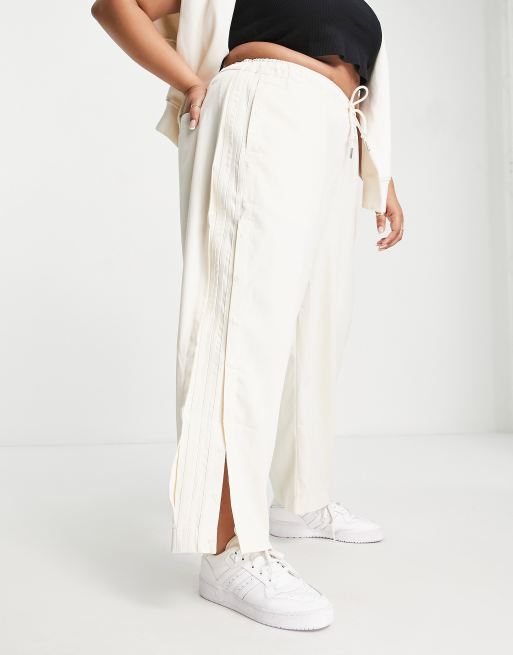 adidas Originals Plus relaxed trousers with popper detail in off white