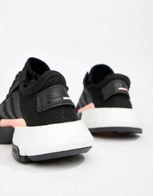 black and pink adidas trainers