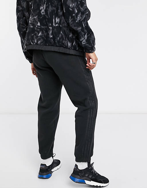 adidas originals polar fleece joggers in black with reflective details in  black tech pack | ASOS