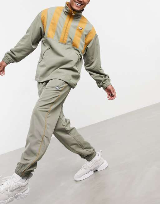 Adidas originals woven cuffed track pants on sale