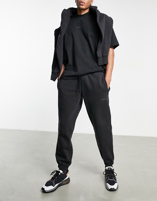 adidas Originals 'Premium Sweats' overdyed joggers in black