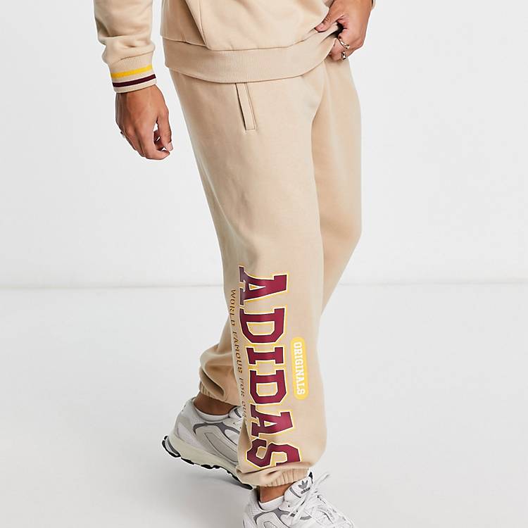 adidas Originals \'Preppy Varsity\' large logo oversized joggers in beige |  ASOS