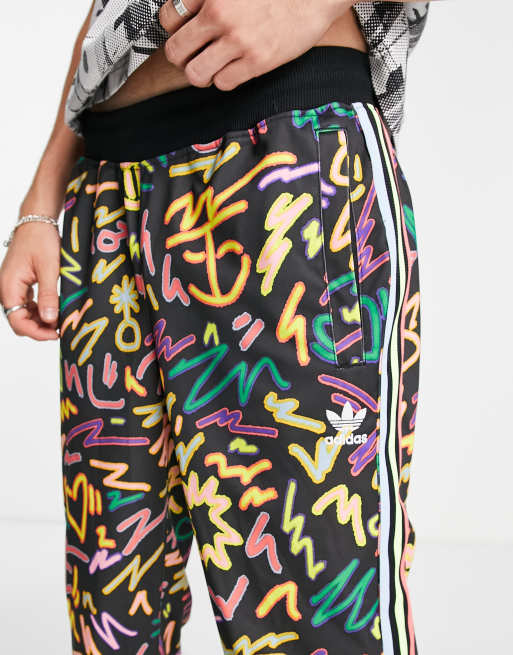 adidas Originals Pride printed track pants in black with Love Unites print ASOS