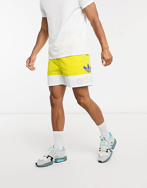 adidas Originals Pride shorts in yellow