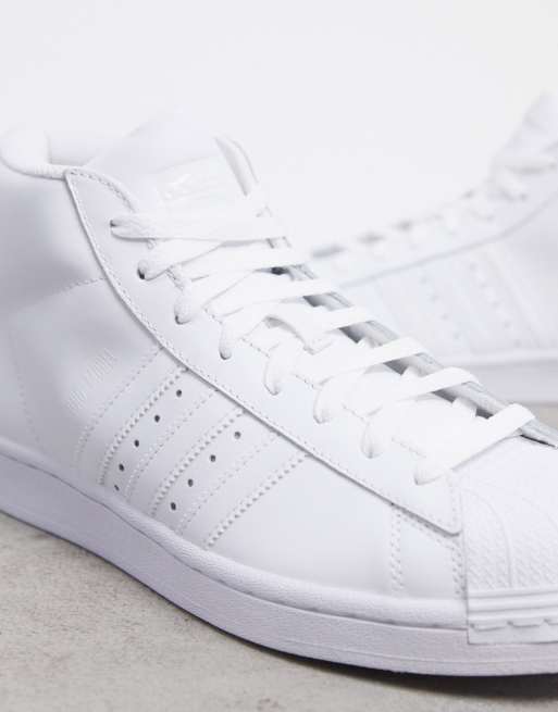 adidas Originals Pro Model hi top sneakers in triple white ASOS