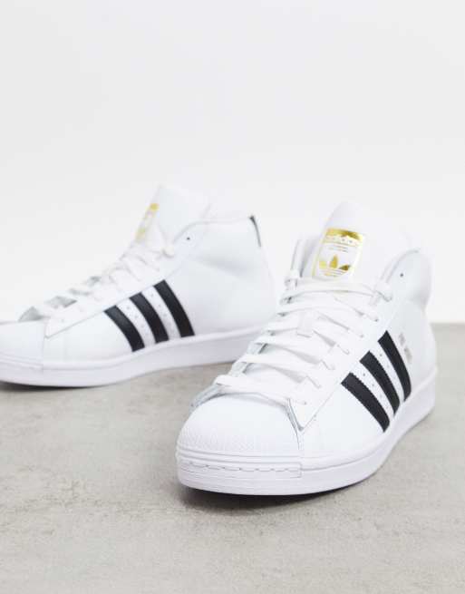 adidas Originals Pro Model Hi top sneakers in white leather