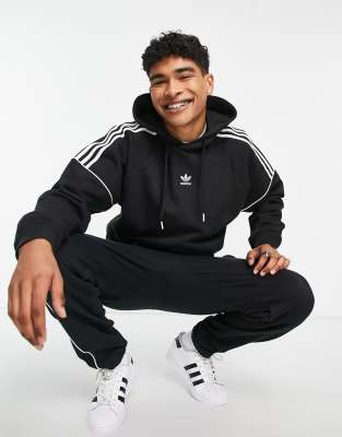 Adidas grey hoodie shop with black stripes