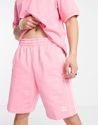 adidas Originals Rekive 3 stripe logo shorts in pink
