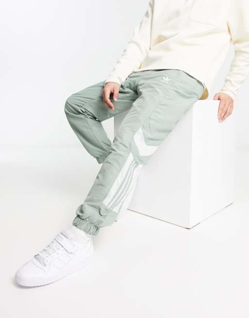 adidas Originals Rekive cut & sew woven track pant in green