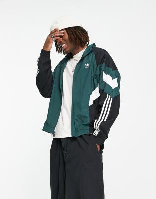 adidas Originals Rekive graphic ASOS woven track in detail | top green