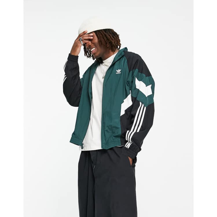 adidas Rekive graphic detail woven track top green | ASOS