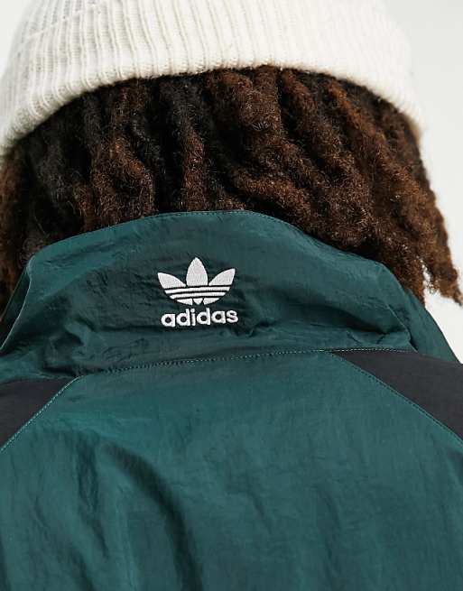 adidas Originals Rekive graphic detail woven track top in green | ASOS