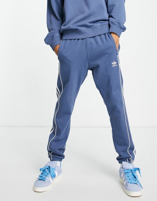 Jogging adidas gris store bande bleu