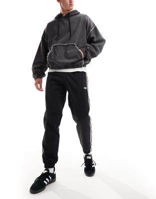adidas Originals Rekive logo trackpants in black - ASOS Price Checker