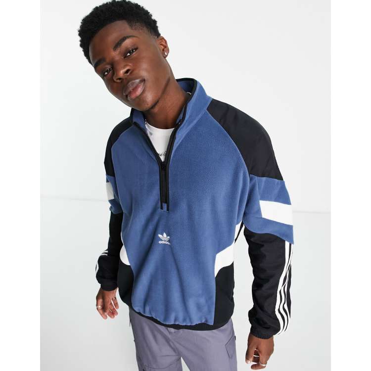 adidas Originals Rekive polar fleece in blue with graphic detail